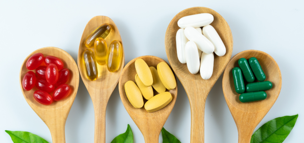 Image showcasing a diverse assortment of foods rich in probiotics, such as yogurt, kefir, sauerkraut, kimchi, and miso. These foods are sources of beneficial microorganisms for gut health.